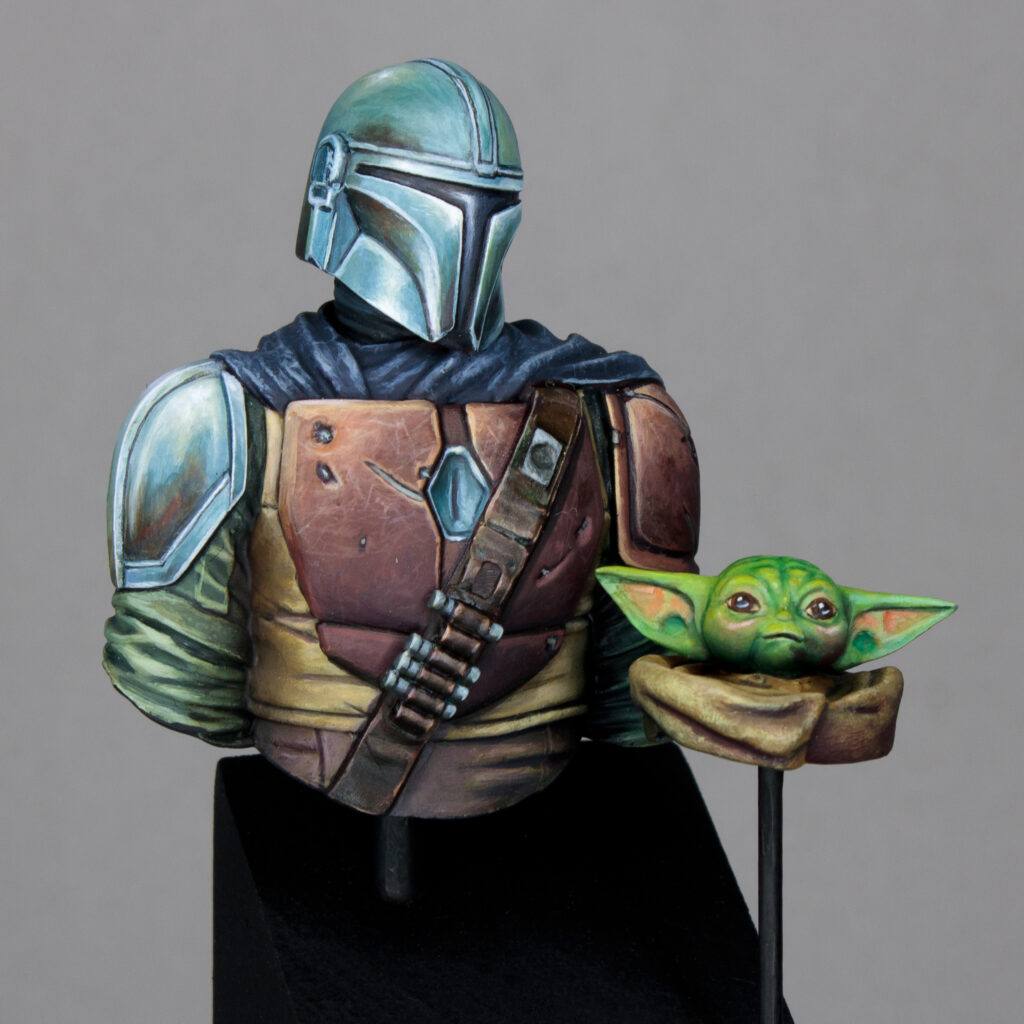Resin painted busts of Mando and Grogu, the protagonists of The Mandalorian.